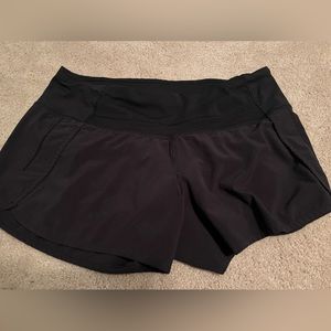Lululemon speed up black shorts size 6 mid rise, 4” length